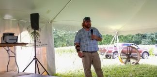 guy standing in front of crowd