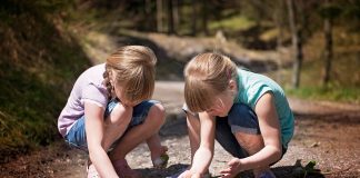 children playing in a stream