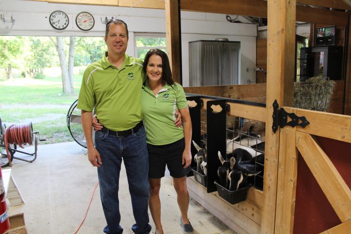 frog-pond-farm people in goat barn