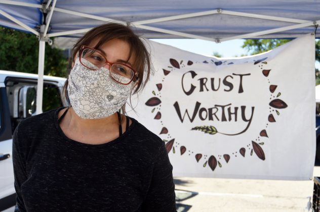 woman in front of sign