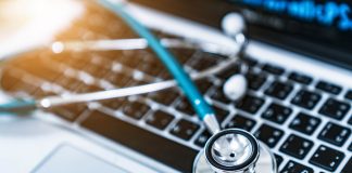 A stethoscope on a computer keyboard.