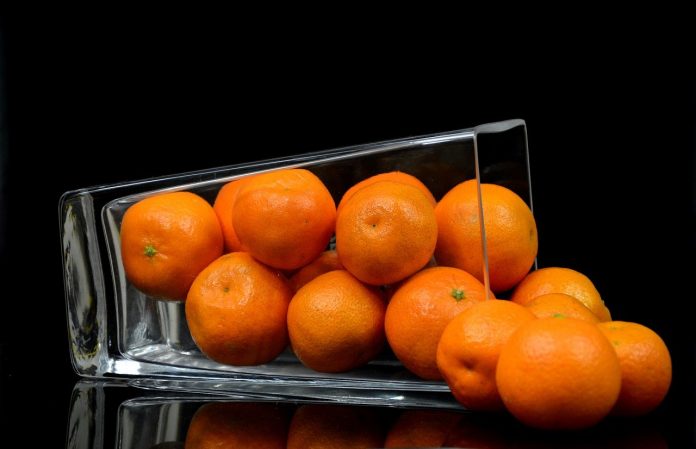 oranges in a glass oranges in a glass