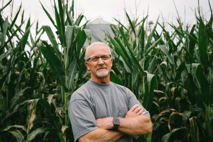 John-Linder john linder stands in corn field