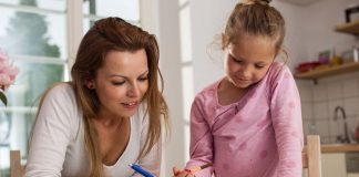 woman homeschooling child