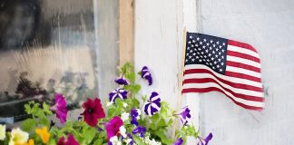 american flag in a flower box
