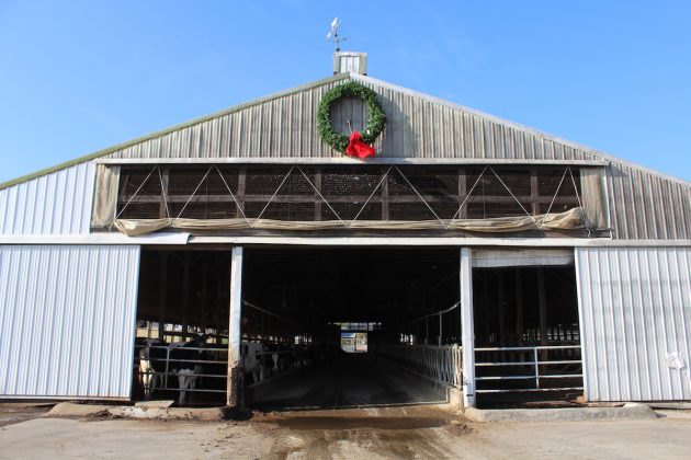 barn with wreath atop