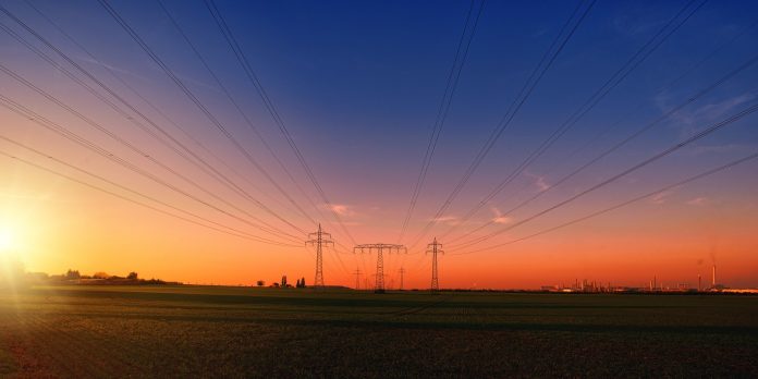 High Tension Power Lines at Sunset High Tension Power Lines at Sunset