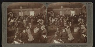 immigrants waiting in Ellis Island for examination