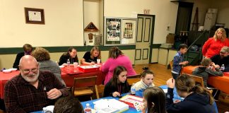 people play board games together