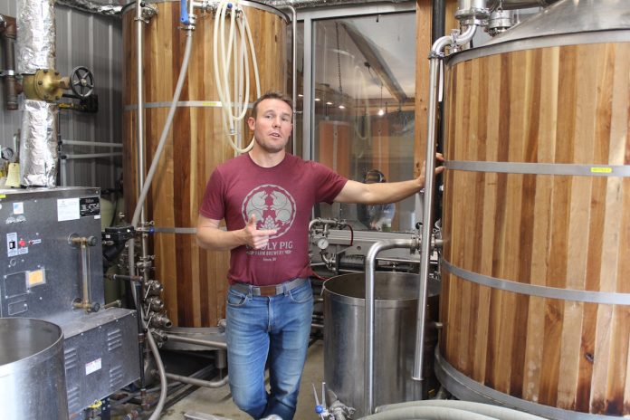 wooly-pig-1 guy standing in brewery