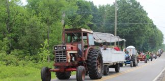 tractors cruising down the road