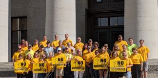group of anti-wind folks on steps in Ohio