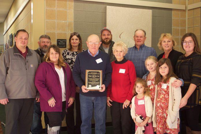 buckeye_symposium_1 A family poses together after receiving an award.