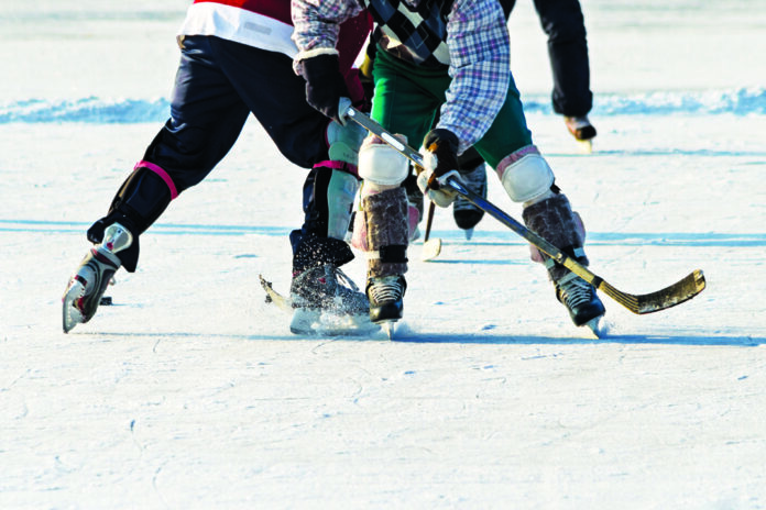 People playing amateur hockey hockey