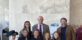 West Virginia's ag commissioner and representatives from the horse industry stand together.