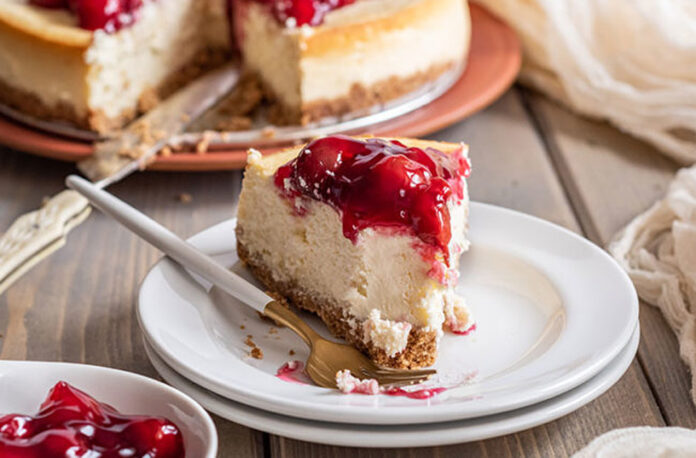 feature.web French Vanilla Cheesecake Topped With Cherries