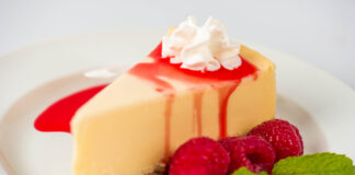 Dakota's Favorite Cheesecake - Cheesecake with a Raspberry and Sour Cream topping