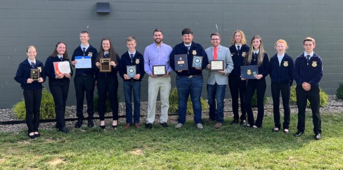 State Convention Photo 2023 a group of FFA memebrs stand together for a group photo after winning an award