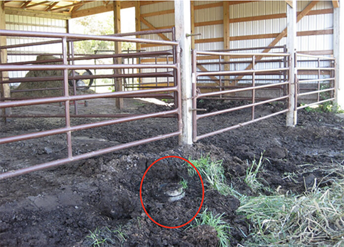orphan well by a barn An orphan well is circled in red near the base of a pole barn.