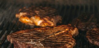 grilled meat on black charcoal grill