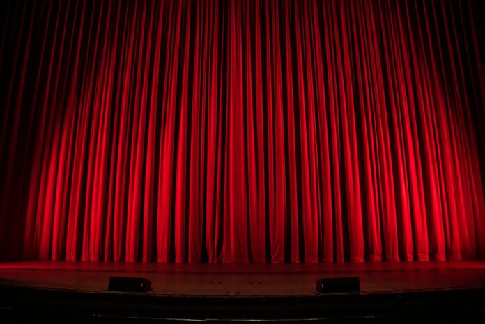 Photo by Rob Laughter red theater curtain