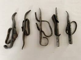 iron husking pegs