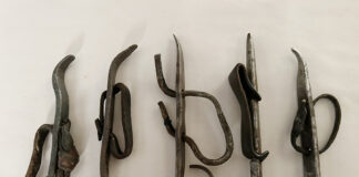 iron husking pegs